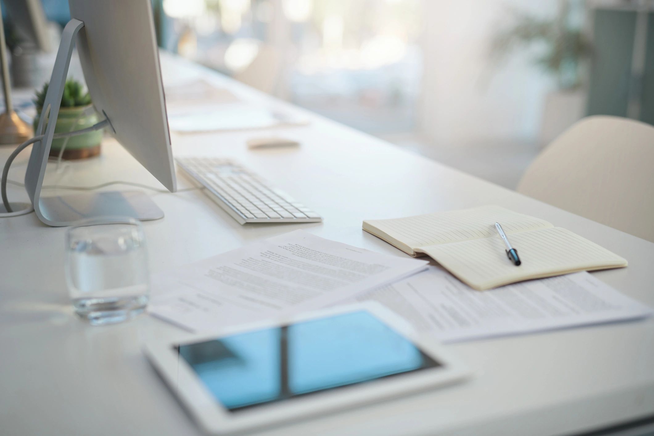 Documents and office desk representing immigration waiver preparation
